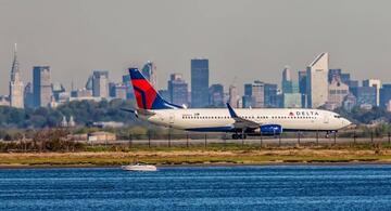 image for Kennedy Airport jetliner aborts takeoff to avoid another jet crossing runway